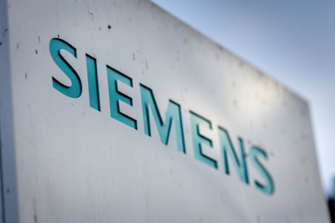 A Siemens company sign in front of a branch office in Siemensstadt in Berlin