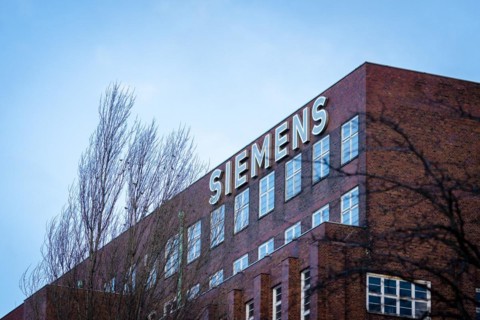A lettering of the Siemens company on a branch in the Siemensstadt in Berlin