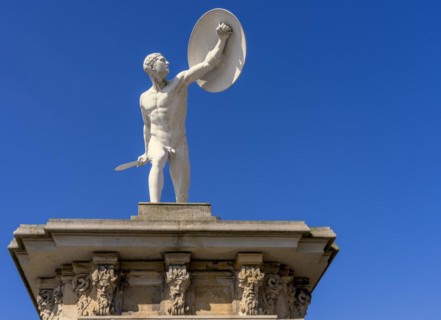 Statue of naked warriors in front of the main entrance to Charlottenburg Palace