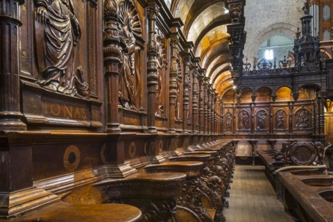 Elaborately carved wooden choir stalls in the Cathedrale Notre-Dame de Saint-Bertrand-de-Comminges cathedral