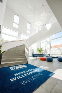 White staircase of the Holiday Inn Hotel