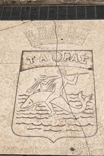 Neptune with trident on fish