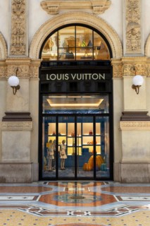Shop window of the luxury shop LOUIS VUITTON at Galleria Vittorio Emanuele II