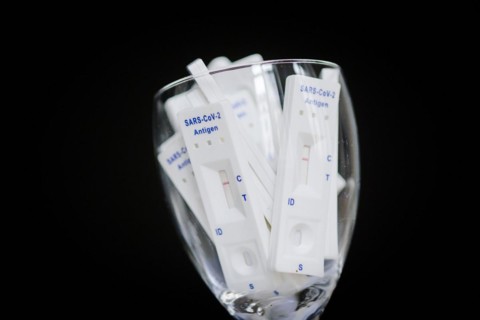 Negative SARS-CoV-2 Rapid Ag Antigen rapid tests are in a jar. Berlin