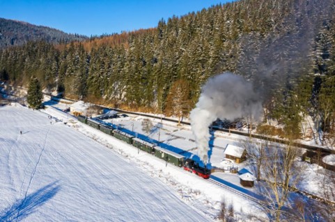 Pressnitztalbahn railway steam train steam locomotive in winter aerial view in Schmalzgrube