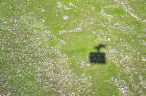 Shadow of a cable car in the high mountains