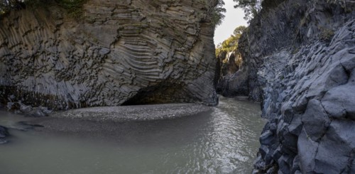 Rock formations of basalt and lava rock in the river park Gole dell' Alcantara