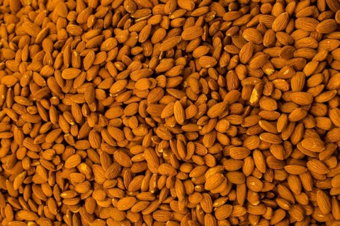 Shot Of Almonds For Sale In Market as background