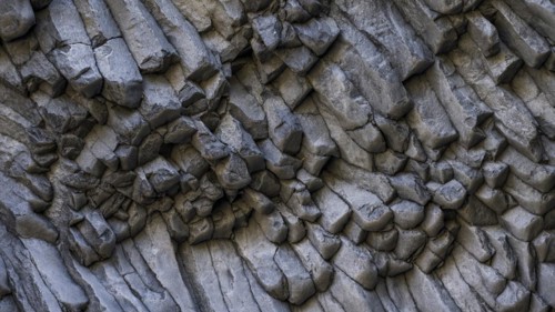 Rock formations of basalt and lava rock in the river park Gole dell' Alcantara