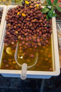 Turkish style prepared olives in the market stands