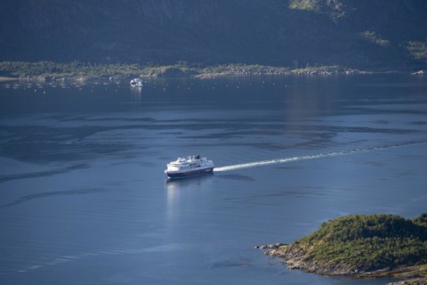 Hurtigruten cruise ship in the fjord
