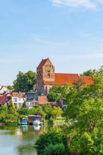 View over the town lake of Lychen to the town church of St. John