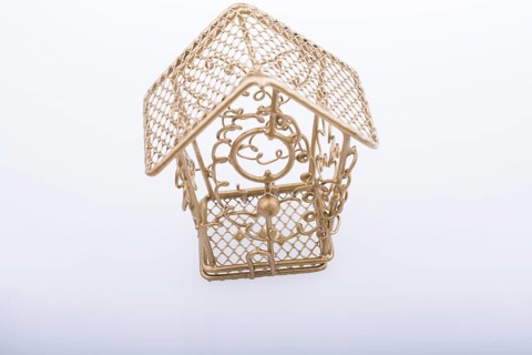 Little white bird house made of metal