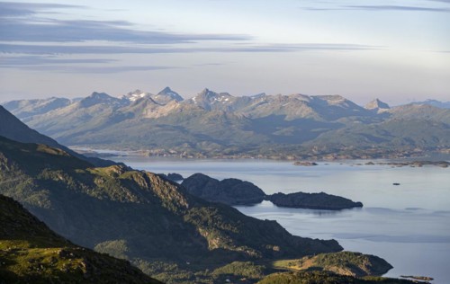 View of fjord and mountains in the evening light
