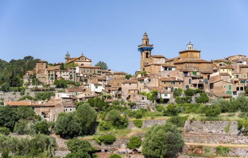 View of Valldemossa mountain village with typical stone houses