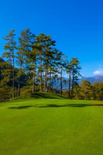 Putting Green on Golf Course Menaggio with Mountain View in Autumn in Lombardy