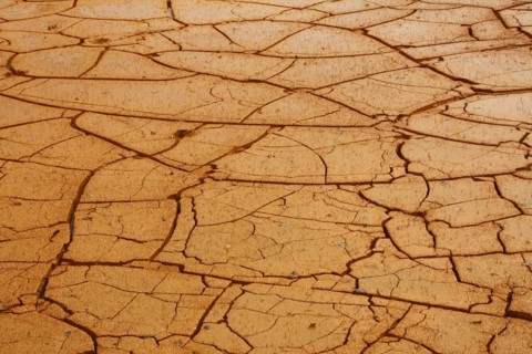 Ochre alluvial basin in the rain