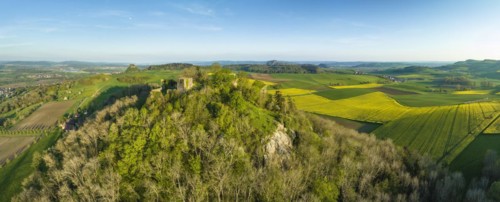 Aerial panorama of the Hegau volcano and the ruins of Maegdeberg Castle
