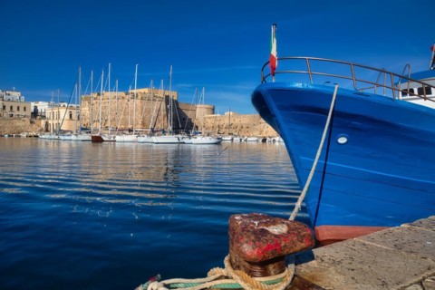 Fishing boat in front of Castelo in the fishing port of Gallipoli