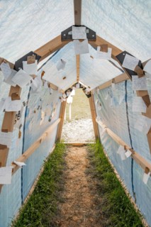 Tunnel with wishlists on Easter path