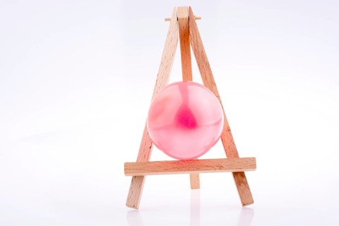 Balloon placed on a tripod for Painting on white background