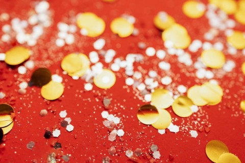 Red tone blurs the bokeh light. Defocused Red and orange holiday bokeh. Abstract christmas background