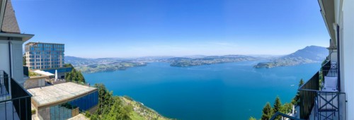 Panoramic View from Hotel Balcony with Mountain View in a Sunny Summer Day in Burgenstock