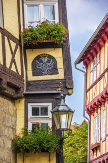 Listed half-timbered house with yellow frames