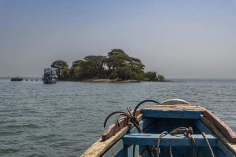 Boats approaching Unesco site Kunta Kinteh or James island