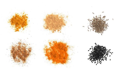 Many spices including Ginger Curry Turmeric Chili pepper Black cumin