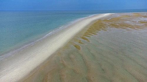 Aerial of a long sand strip