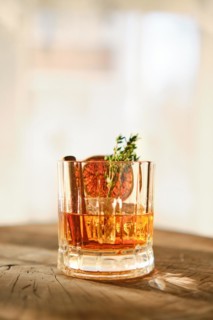 Spicy and sour bourbon and ice sunny cocktail