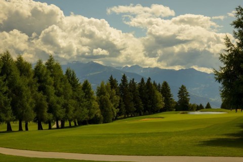 Crans Sur Sierre Golf Course with House and Mountain View in Crans Montana in Valais