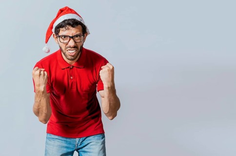 Man with beard and christmas hat