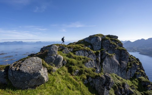Hikers at the top of Dronningsvarden or Stortinden