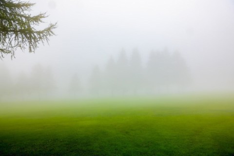 Crans Sur Sierre Golf Course with Fog in Crans Montana in Valais