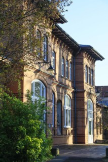 Historic brick building behind the former sulphur bathhouse