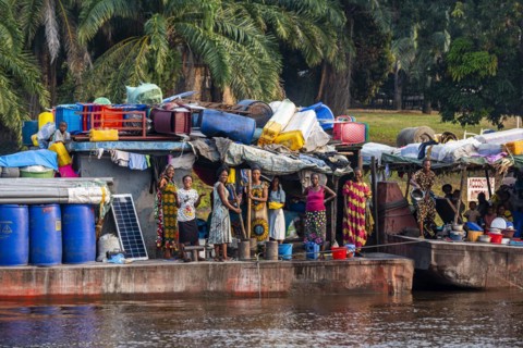 Overloaded riverboat on the Congo river