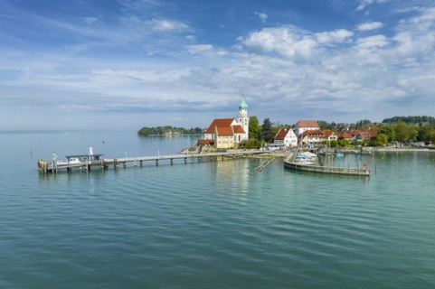 Aerial view of the moated castle peninsula on Lake Constance with the baroque church of St. George