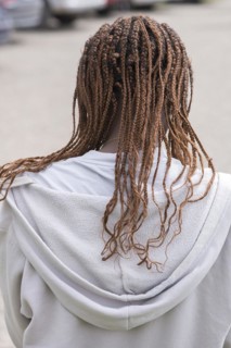 Woman with braided pigtails