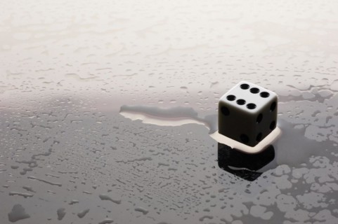 Dice on a wet surface