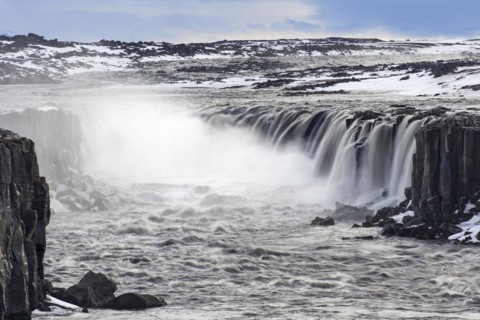 Selfoss waterfall on the river Joekulsa a Fjoellum in in the Joekulsargljufur canyon in winter