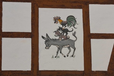 Half-timbered house with painting of the Bremen Town Musicians