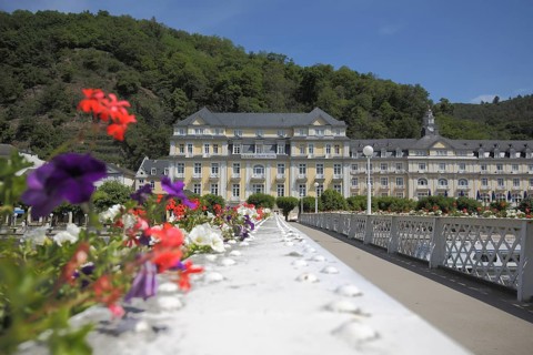 Flower decoration at the Kurbruecke over the Lahn and Hotel spa hotel