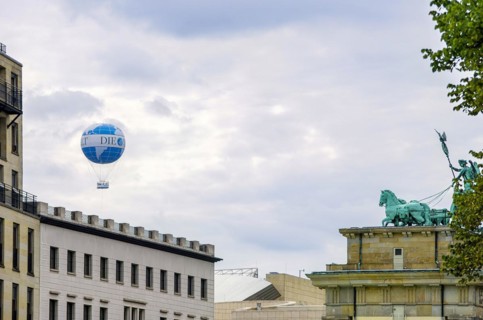 Roman Quadriga with Germania on the Brandenburg Gate and tethered balloon DIE WELT as viewing platform