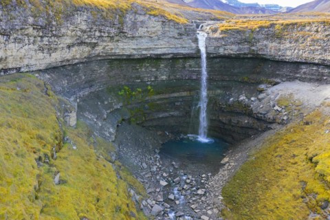 Waterfall Hemsilfossen on the Hemsil river at Ekmanfjorden in summer