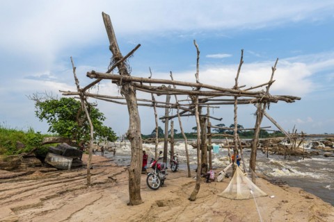 Wooden tripods with baskets attached
