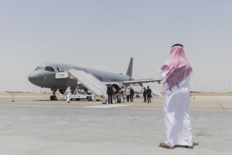A man in traditional dress photographed in front of the Airbus A321 of the Air Force in Jeddah
