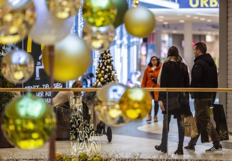 Christmas shopping under festive decorations