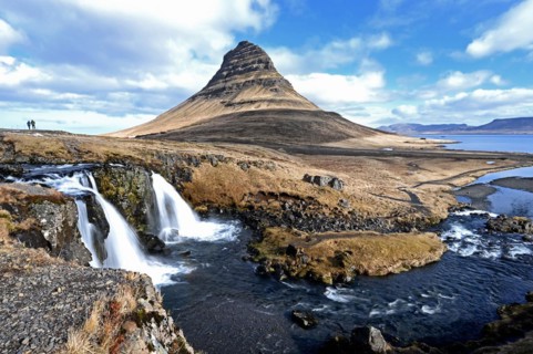 Kirkjufellsfoss waterfall and Kirkjufell mountain on the north coast of the Snaefellsnes peninsula in western Iceland
